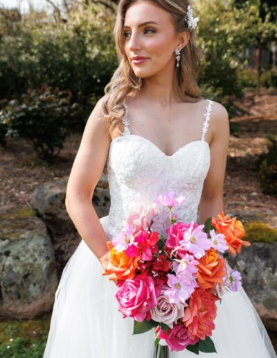 Beautiful bridal gown with lace bodice, v waistline, full tulle skirt, perfect for a winery wedding