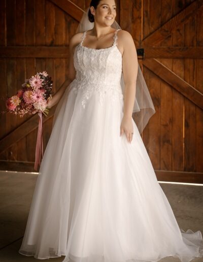 Bridal dress with lace bodice, square neckline and organza skirt