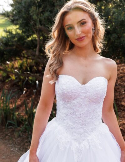 Beautiful bridal gown with lace bodice, v waistline, full tulle skirt, perfect for a winery wedding