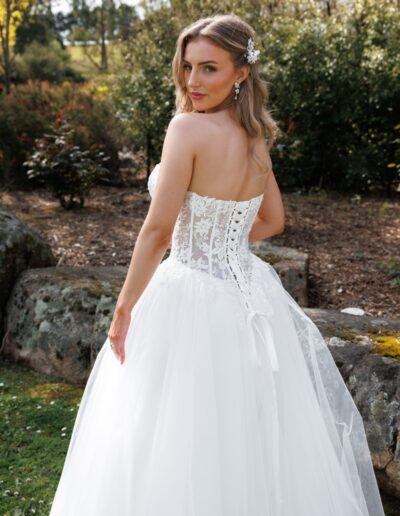 Beautiful bridal gown with lace bodice, v waistline, full tulle skirt, perfect for a winery wedding